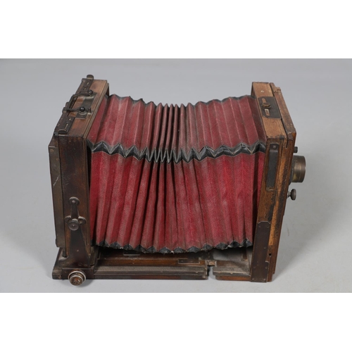 541 - LARGE PLATE CAMERA - PHOTO HALL, PARIS. A large mahogany plate camera with red coloured bellows, wit... 