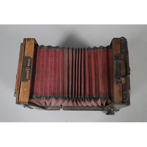 541 - LARGE PLATE CAMERA - PHOTO HALL, PARIS. A large mahogany plate camera with red coloured bellows, wit... 