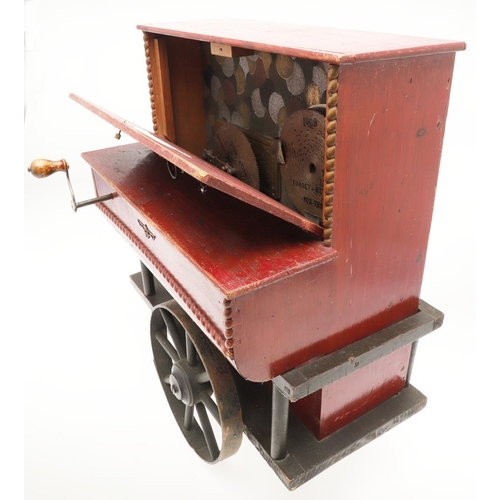 542 - UNUSUAL BARREL ORGAN DISC PLAYER. A late 19thc disc player in the form of a barrel organ, wound with... 