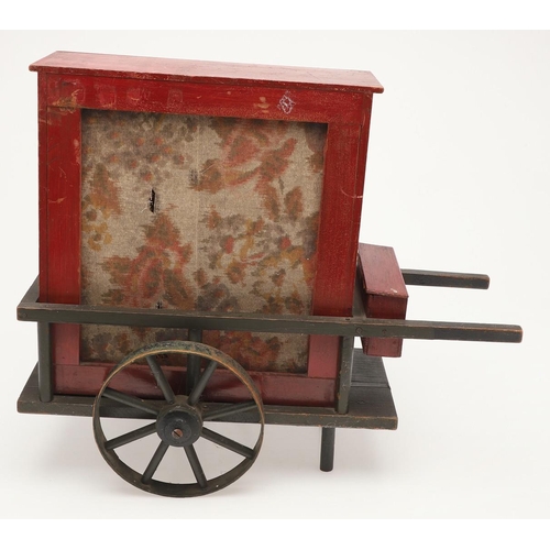 542 - UNUSUAL BARREL ORGAN DISC PLAYER. A late 19thc disc player in the form of a barrel organ, wound with... 