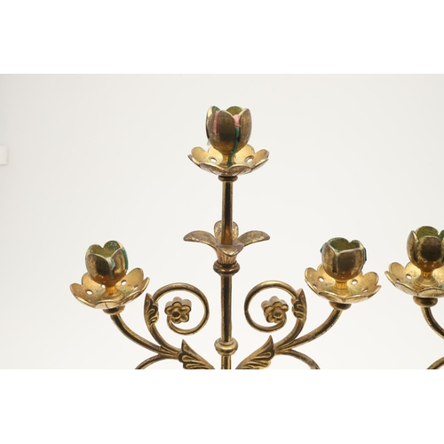 551 - PAIR OF ARTS & CRAFTS GILT BRASS CANDLESTICKS. In the manner of Eugene Emmanuel Viollet Le Duc, the ... 