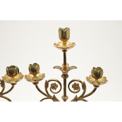 551 - PAIR OF ARTS & CRAFTS GILT BRASS CANDLESTICKS. In the manner of Eugene Emmanuel Viollet Le Duc, the ... 