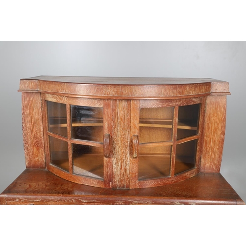 553 - ART DECO LIMED OAK SIDEBOARD - POSSIBLY BY HEALS. A limed oak sideboard possibly by Heals, the bow f... 