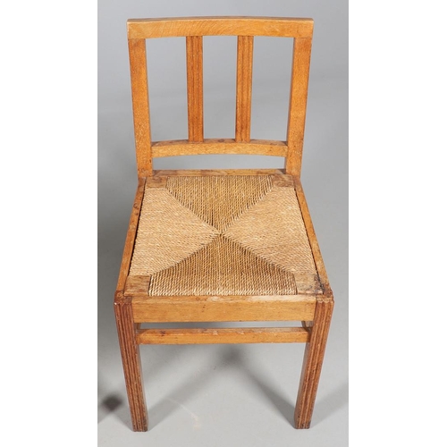 554 - BRYNMAWR FURNITURE - PAIR OF DINING CHAIRS. A pair of oak dining chairs with vertical splats and dro... 