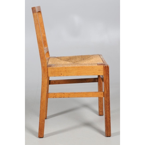 554 - BRYNMAWR FURNITURE - PAIR OF DINING CHAIRS. A pair of oak dining chairs with vertical splats and dro... 