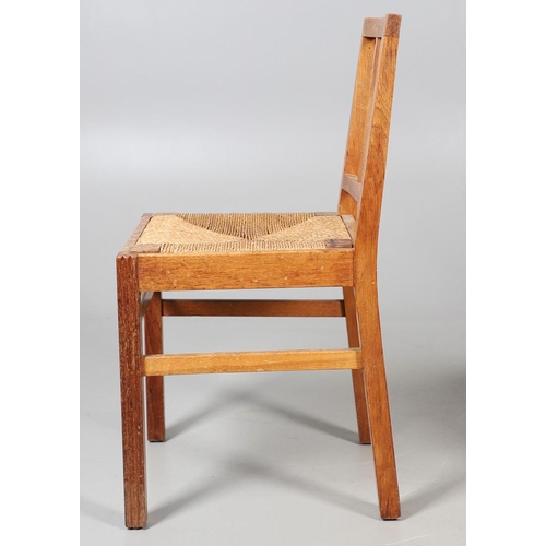 554 - BRYNMAWR FURNITURE - PAIR OF DINING CHAIRS. A pair of oak dining chairs with vertical splats and dro... 