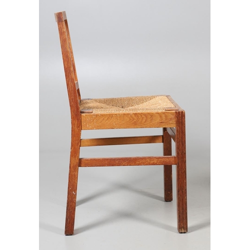 554 - BRYNMAWR FURNITURE - PAIR OF DINING CHAIRS. A pair of oak dining chairs with vertical splats and dro... 