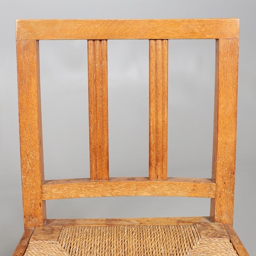 554 - BRYNMAWR FURNITURE - PAIR OF DINING CHAIRS. A pair of oak dining chairs with vertical splats and dro... 