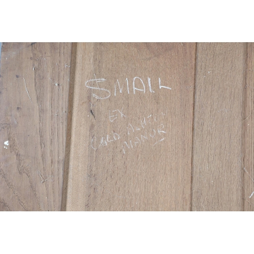 559 - A COTSWOLD SCHOOL ARTS AND CRAFTS OAK WARDROBE BY ERNEST GIMSON. A large and impressive oak Cotswold... 