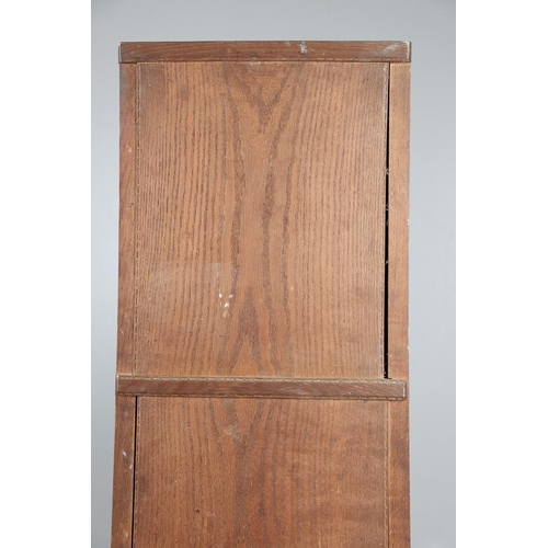 559 - A COTSWOLD SCHOOL ARTS AND CRAFTS OAK WARDROBE BY ERNEST GIMSON. A large and impressive oak Cotswold... 