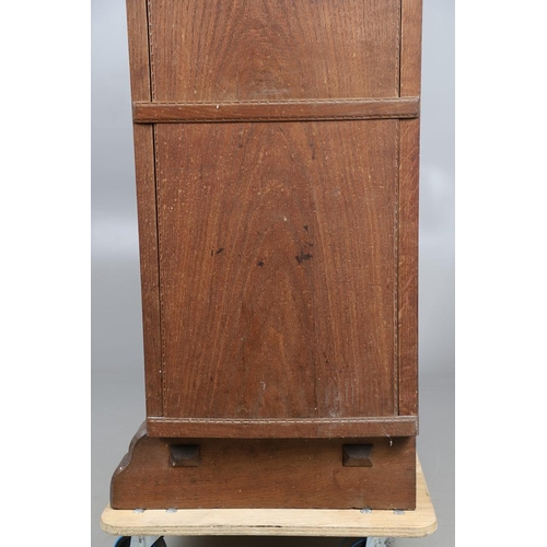 559 - A COTSWOLD SCHOOL ARTS AND CRAFTS OAK WARDROBE BY ERNEST GIMSON. A large and impressive oak Cotswold... 