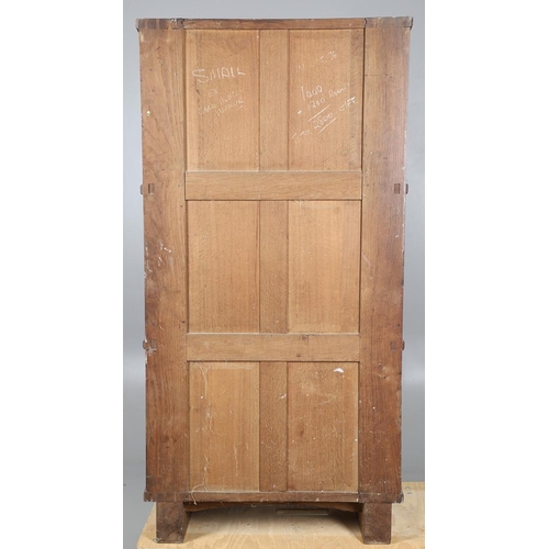 559 - A COTSWOLD SCHOOL ARTS AND CRAFTS OAK WARDROBE BY ERNEST GIMSON. A large and impressive oak Cotswold... 