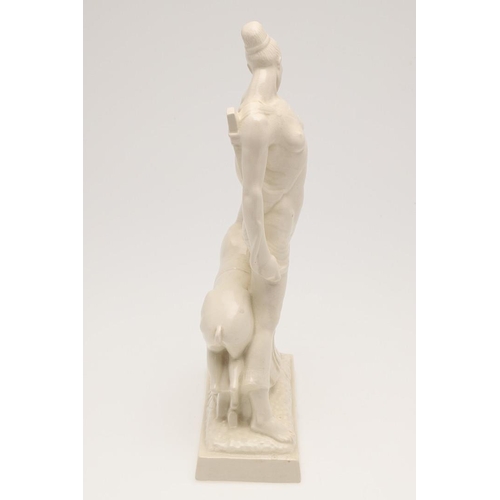 563 - DAVID EVANS - ART DECO POTTERY FIGURE. A signed and dated pottery figure of a lady cradling a horse,... 