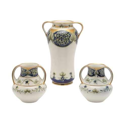 568 - WILLIAM MOORCROFT - MACINTYRE FLORIAN VASE & PAIR OF VASES - LILAC. Three items in the Florian Lilac... 