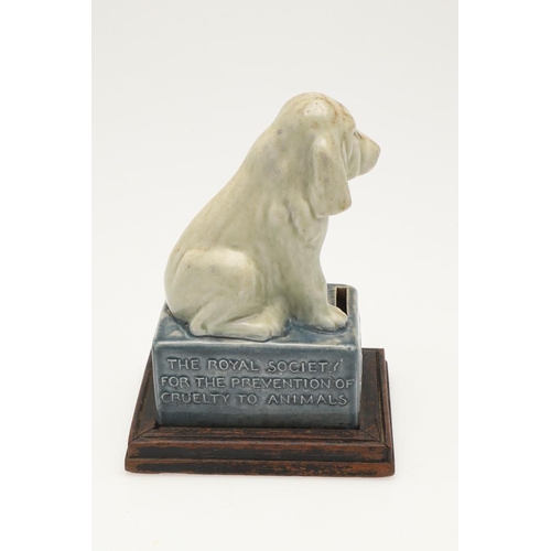 569 - RARE DOULTON LAMBETH COLLECTING BOX - RSPCA. A rare Doulton stoneware collecting box in the form of ... 