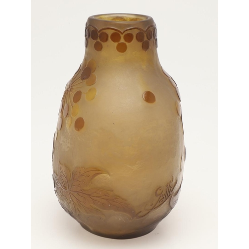 577 - GALLE CAMEO GLASS VASE. A Galle cameo glass vase, etched with flowers and berries in brown and yello... 