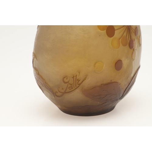 577 - GALLE CAMEO GLASS VASE. A Galle cameo glass vase, etched with flowers and berries in brown and yello... 