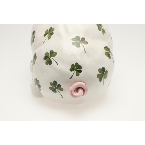 580 - A LARGE WEMYSS SHAMROCK PIG. A Wemyss pig of large size, painted with shamrocks to the body. Painted... 