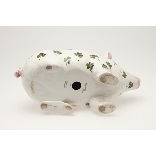 580 - A LARGE WEMYSS SHAMROCK PIG. A Wemyss pig of large size, painted with shamrocks to the body. Painted... 