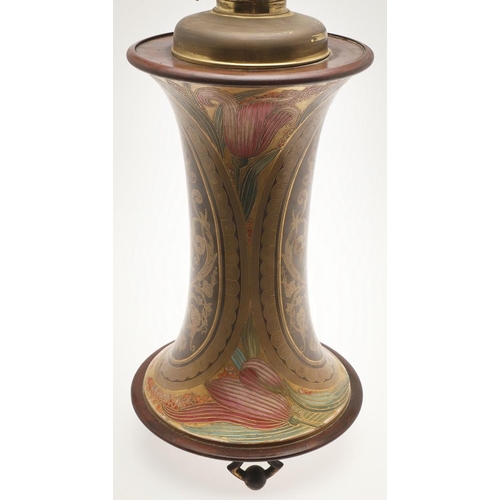 585 - LARGE ART NOUVEAU OIL LAMP. A large and unusual pottery oil lamp, of waisted form with an Art Nouvea... 