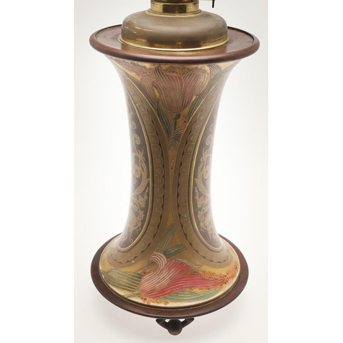 585 - LARGE ART NOUVEAU OIL LAMP. A large and unusual pottery oil lamp, of waisted form with an Art Nouvea... 