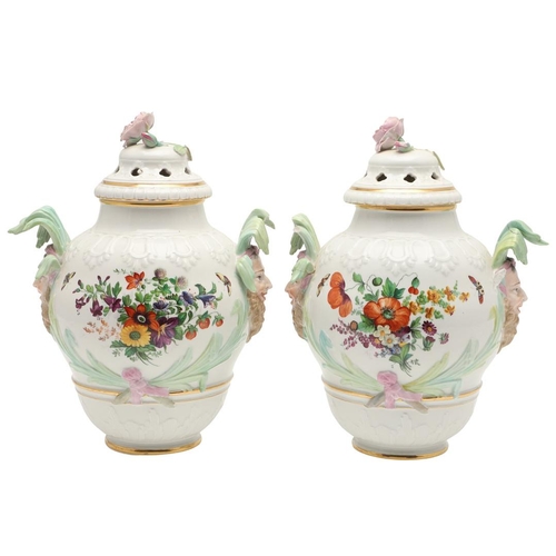 587 - PAIR OF KPM BERLIN LIDDED PORCELAIN JARS. The large jars with pierced lids with flower finials, the ... 