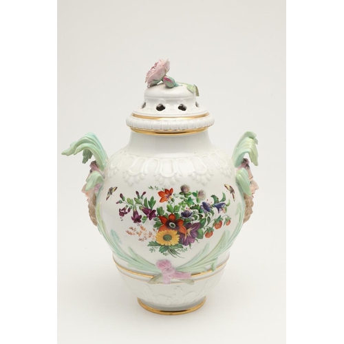 587 - PAIR OF KPM BERLIN LIDDED PORCELAIN JARS. The large jars with pierced lids with flower finials, the ... 