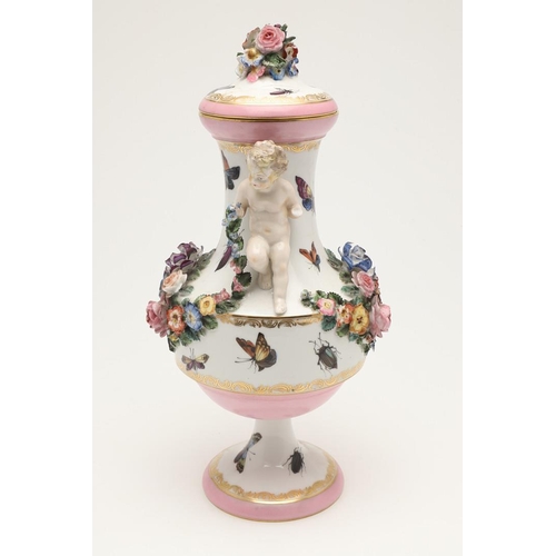 588 - PAIR OF MEISSEN STYLE LIDDED VASES. A pair of large lidded vases or jars, the lids with floral encru... 