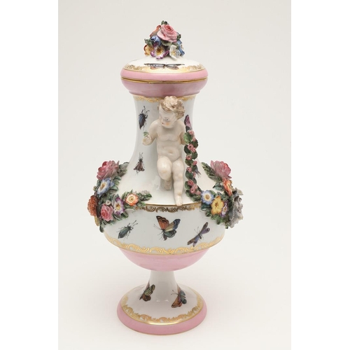 588 - PAIR OF MEISSEN STYLE LIDDED VASES. A pair of large lidded vases or jars, the lids with floral encru... 