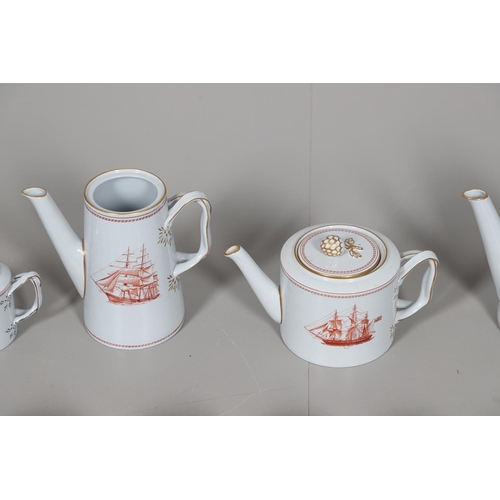 595 - SPODE TRADE WINDS - COFFEE & TEA SERVICE. A large qty of tea and coffee ware in the Trade Winds Red ... 