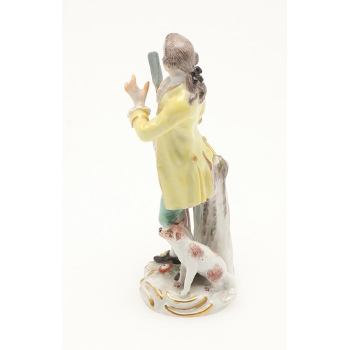 597 - TWO MEISSEN PORCELAIN FIGURES. Including a porcelain figure of a lady holding a box with small anima... 