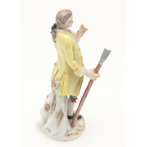 597 - TWO MEISSEN PORCELAIN FIGURES. Including a porcelain figure of a lady holding a box with small anima... 