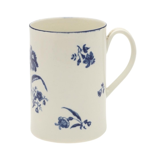 599 - A WORCESTER BLUE AND WHITE PORCELAIN GILLIFLOWER PATTERN CYLINDRICAL MUG. decorated in underglaze bl... 