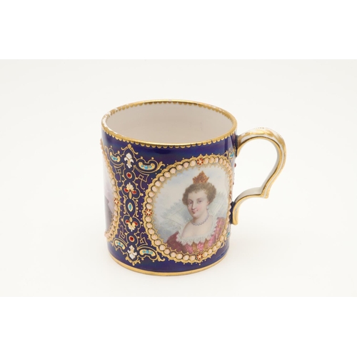 600 - A SEVRES STYLE BLUE GROUND JEWELLED CABINET CUP AND SAUCER. late 19th century, the cup painted with ... 