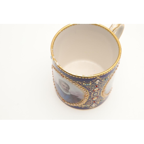 600 - A SEVRES STYLE BLUE GROUND JEWELLED CABINET CUP AND SAUCER. late 19th century, the cup painted with ... 