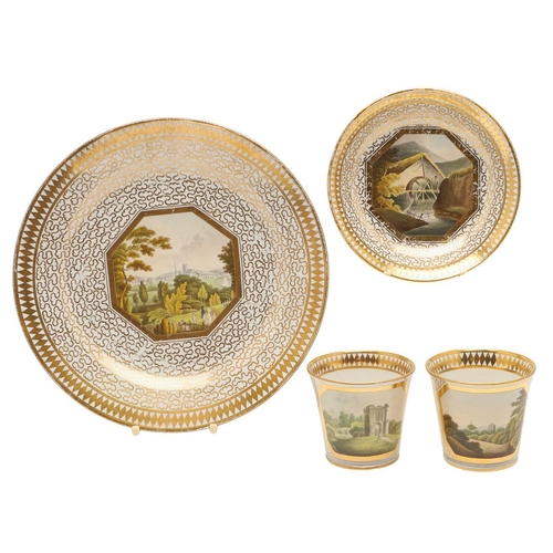 603 - A CHAMBERLAIN WORCESTER TOPOGRAPHICAL DESSERT PLATE, TWO CUPS AND A SAUCER, C. 1805-1815. each decor... 