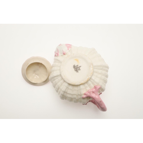 604 - BELLEEK TRAY & TEA SERVICE. A large shell shaped tray with a pink coloured rim (41.5cms across), als... 