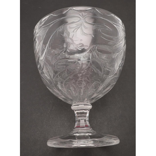 605 - STOURBRIDGE PEDESTAL GLASS BOWL. The large cut glass bowl with flowers and other motifs and with a f... 