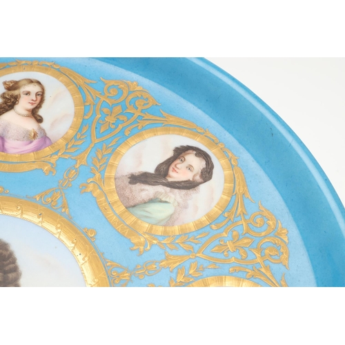 606 - LARGE SEVRES STYLE PORCELAIN CHARGER - LOUIS XIV. A large porcelain charger, painted in the centre w... 