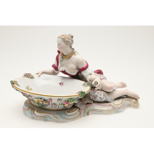 611 - PAIR OF MEISSEN FIGURAL DISHES. A pair of Meissen sweet meat dishes, modelled as a lady and gent hol... 