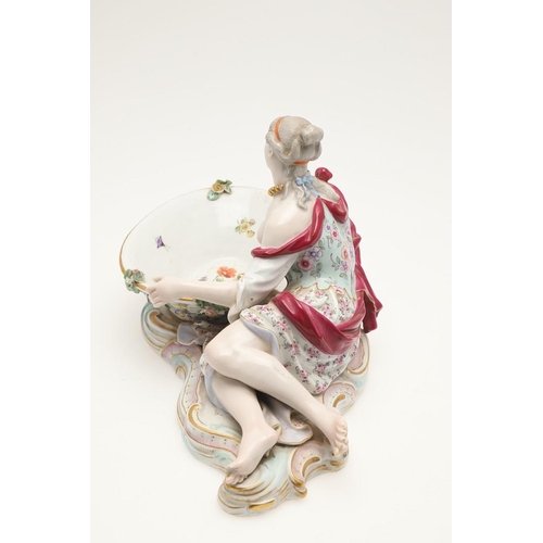 611 - PAIR OF MEISSEN FIGURAL DISHES. A pair of Meissen sweet meat dishes, modelled as a lady and gent hol... 