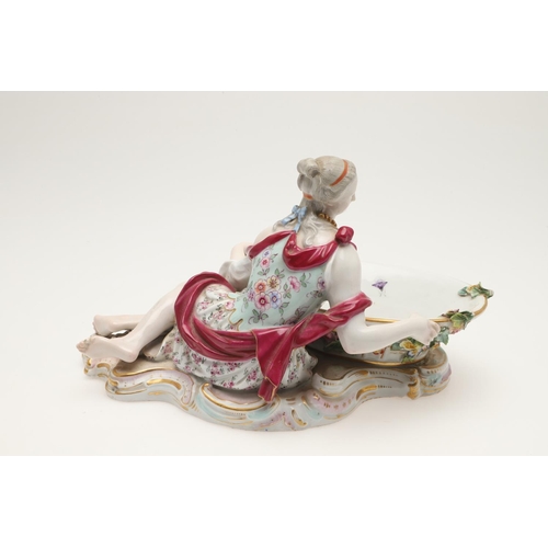 611 - PAIR OF MEISSEN FIGURAL DISHES. A pair of Meissen sweet meat dishes, modelled as a lady and gent hol... 