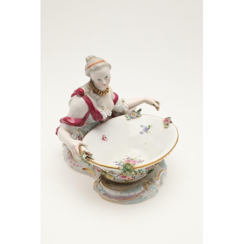 611 - PAIR OF MEISSEN FIGURAL DISHES. A pair of Meissen sweet meat dishes, modelled as a lady and gent hol... 