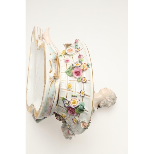 611 - PAIR OF MEISSEN FIGURAL DISHES. A pair of Meissen sweet meat dishes, modelled as a lady and gent hol... 