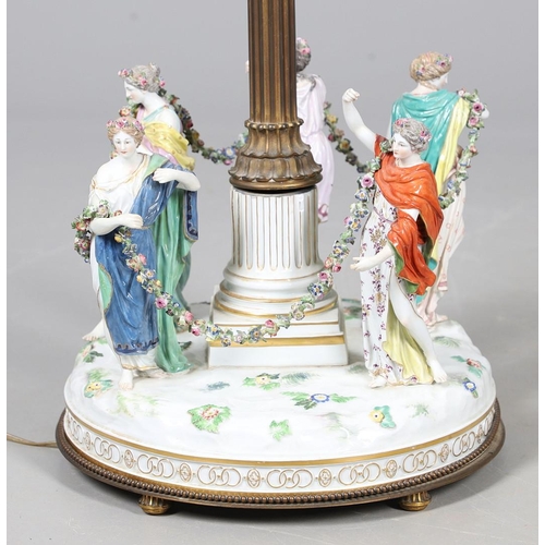 612 - MEISSEN CENTREPIECE - DANCE OF THE HORAE. A large 19thc Meissen centrepiece now converted into a lam... 