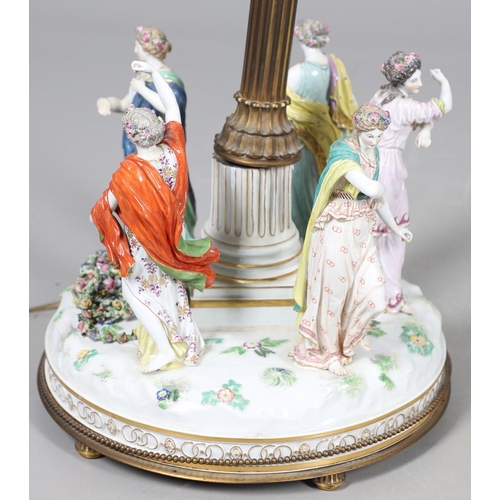 612 - MEISSEN CENTREPIECE - DANCE OF THE HORAE. A large 19thc Meissen centrepiece now converted into a lam... 