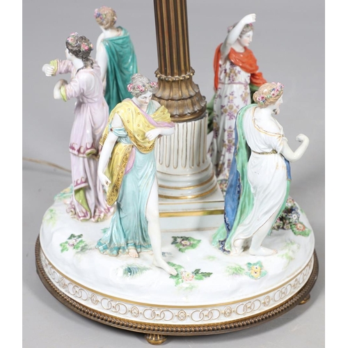 612 - MEISSEN CENTREPIECE - DANCE OF THE HORAE. A large 19thc Meissen centrepiece now converted into a lam... 