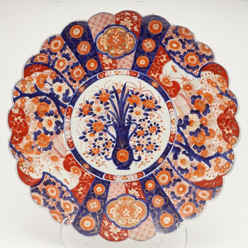 620 - LARGE JAPANESE IMARI CHARGER. Meiji period, an unusually large Imari charger, the fluted body painte... 