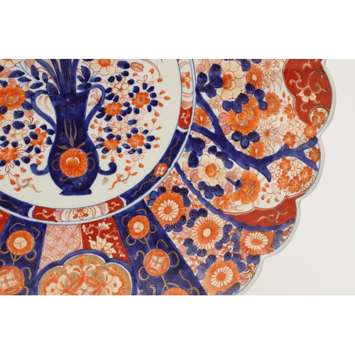 620 - LARGE JAPANESE IMARI CHARGER. Meiji period, an unusually large Imari charger, the fluted body painte... 