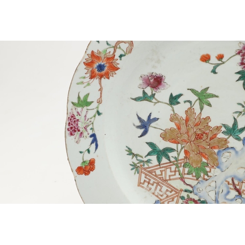 633 - 18THC CHINESE FAMILLE ROSE DISH - STAFFORD'S OF LONDON. A 18thc large dish, painted with flowers and... 